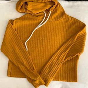 Crop top sweater/hoodie.